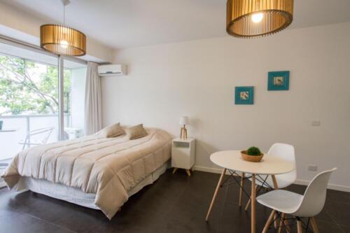 Studio Apart with Balcony dormitorio